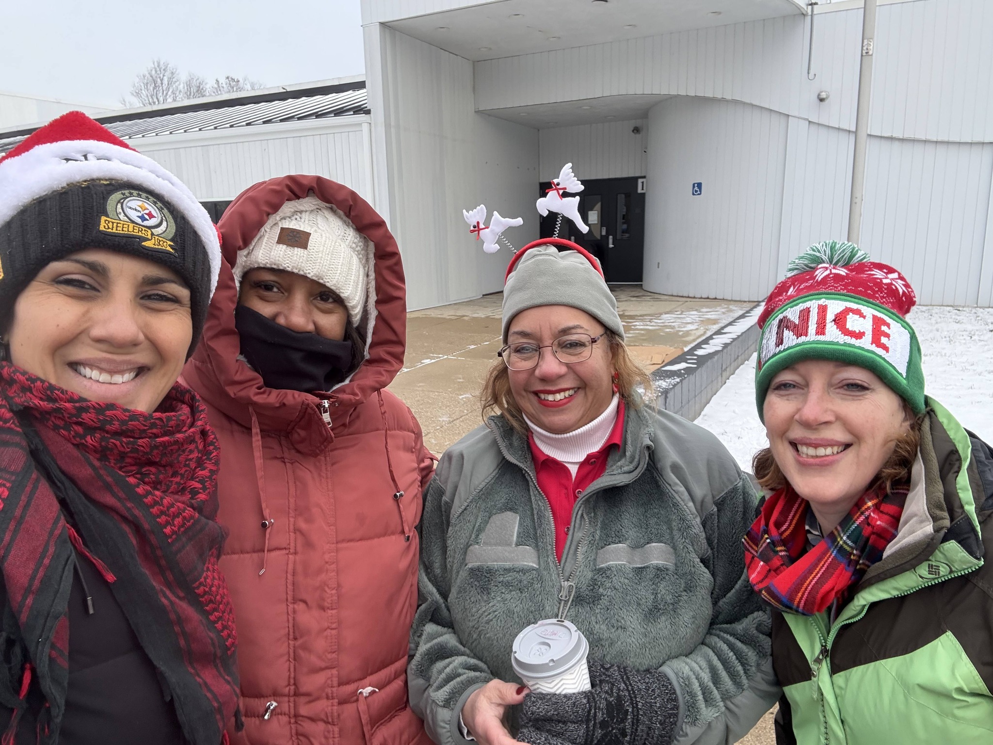 Toni with board member Suhey and volunteers